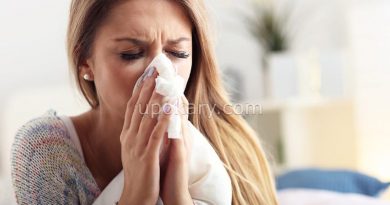 woman sneezing